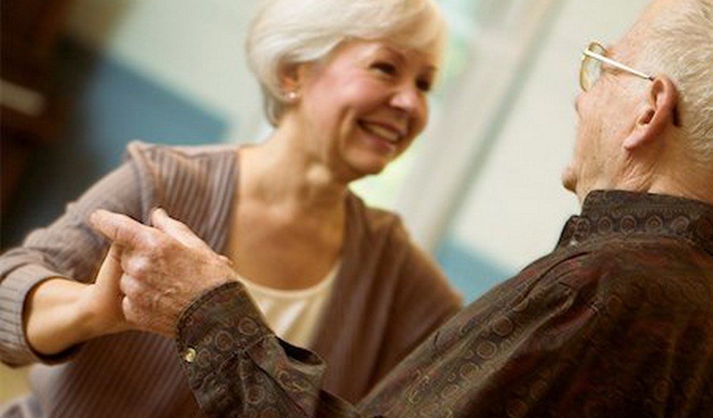 Senior Couple dancing together knowing that they avoided the Part D Late Enrollment Penalty