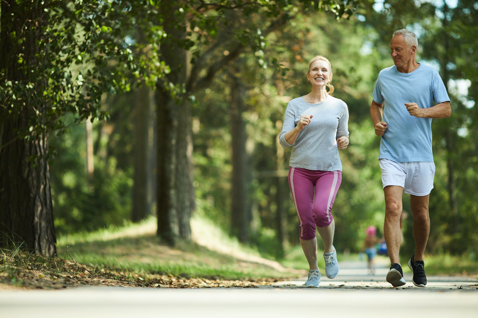 Seniors jogging as they discuss Medicare Advantage vs. Medigap